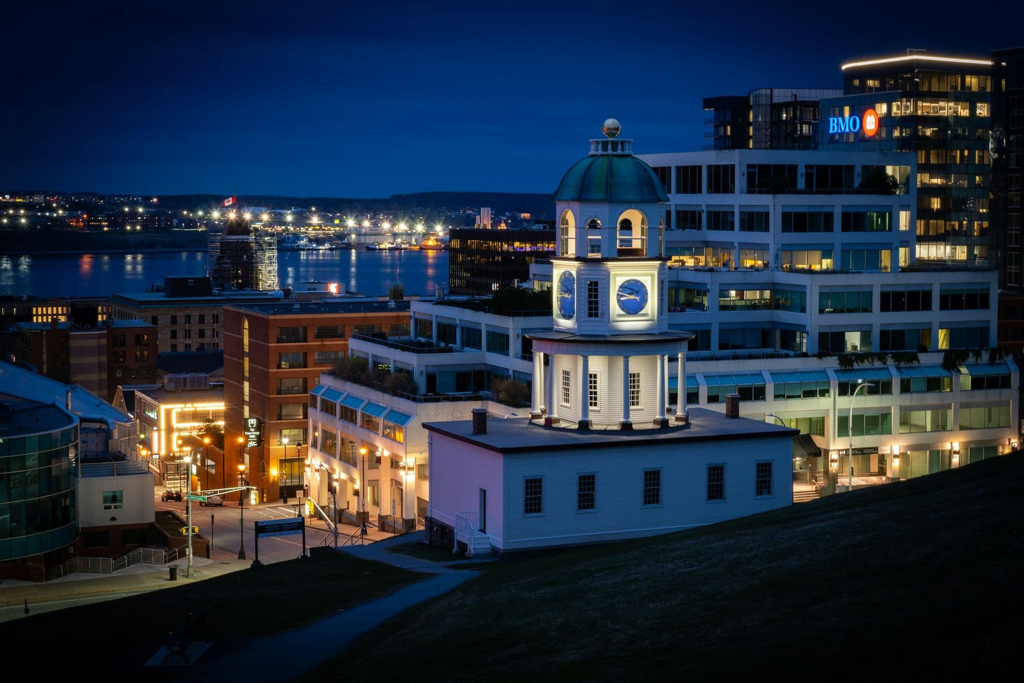 The Halifax Town Clock and harbour at night