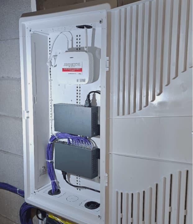 Eddy gateway and controller in a wall enclosure.