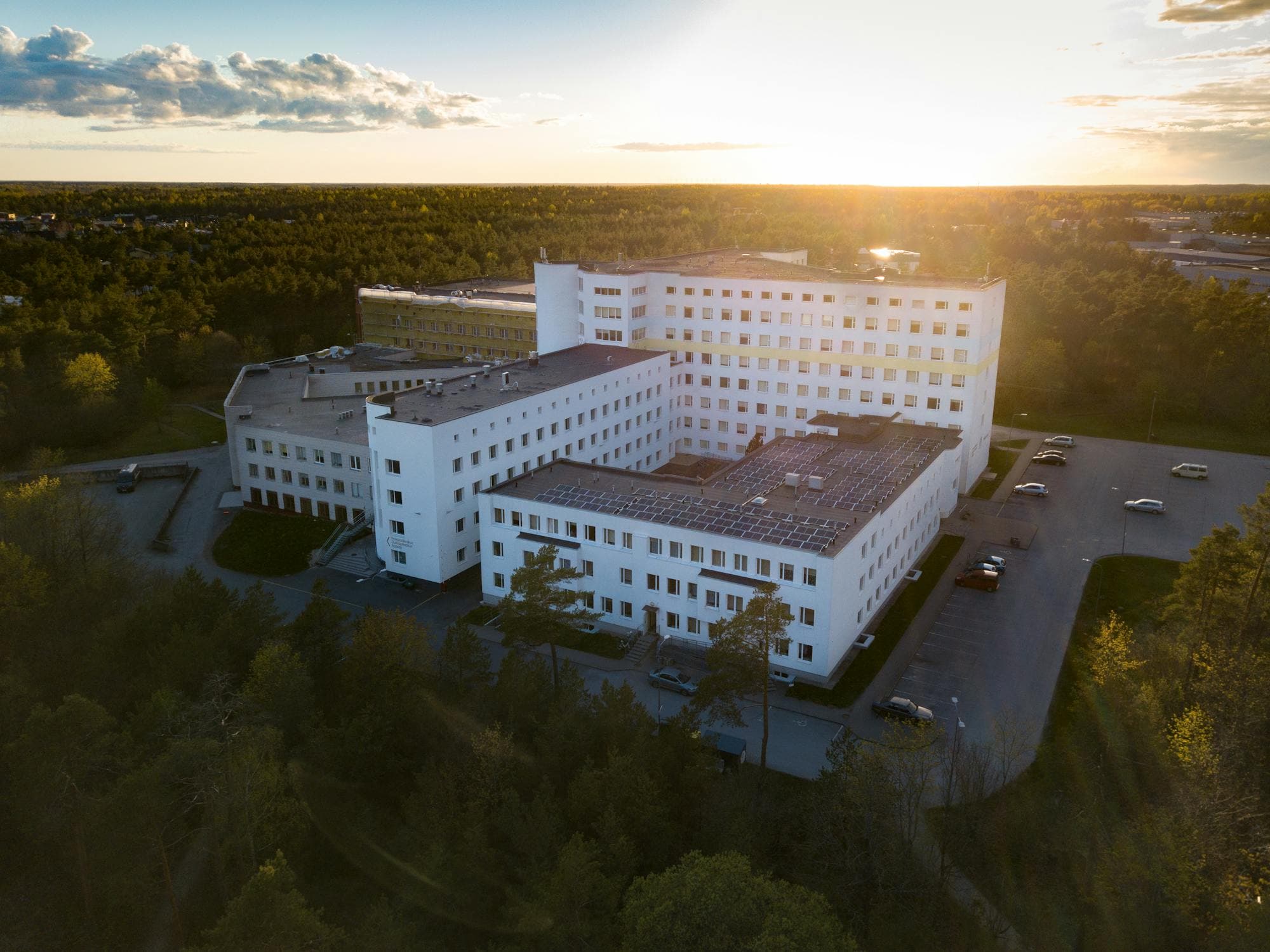 Aerial view of a large modern hospital complex.