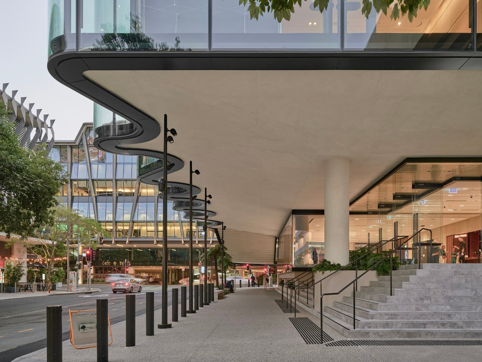 Mixed-use building with ground-floor retail and offices above.