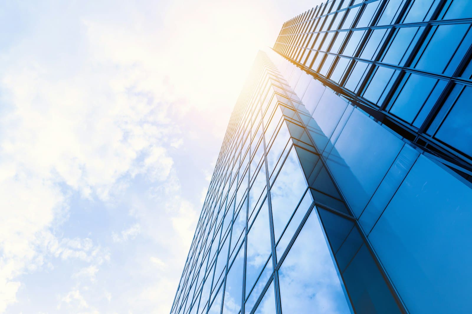 Glass commercial high-rise viewed from below